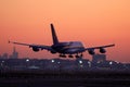 A380 Airbus plane landing at airport, silhouette Royalty Free Stock Photo