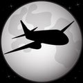 Silhouette of an airplane flying across a full moon. Royalty Free Stock Photo