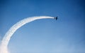 Silhouette of an airplane performing flight at airshow