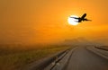 Silhouette of an airplane at sunset Royalty Free Stock Photo