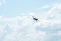 Silhouette of an airplane with trail of smoke behind. Royalty Free Stock Photo