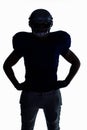 Silhouette American football player standing with hand on hip Royalty Free Stock Photo