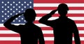 Silhouette american soldiers salute on usa flag Royalty Free Stock Photo
