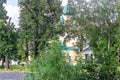 Fragment of the reconstructed bell tower of the old church, classical style architecture, columns and friezes, narrow windows, sev