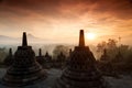 Silhouette of Ancient stupa Borobudur Temple, with sunrise in Yo