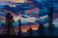 Silhouette of the Antenna of cellular cell phone and communication system tower on cloud and blue sky Royalty Free Stock Photo