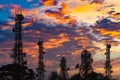 Silhouette of the Antenna of cellular cell phone and communication system tower on cloud and blue sky Royalty Free Stock Photo