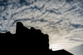 The silhouette of the apartment building with a dramatic sky