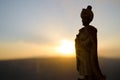 Silhouette of Arab man stands alone in the desert and watching the sunset with clouds of fog. Eastern Fairytale Royalty Free Stock Photo