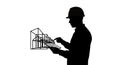 Engineer Silhouette with AR Tablet and 3D Building Model Royalty Free Stock Photo