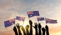 Silhouette of arms raised waving an Australia flag with pride. 3D Rendering Royalty Free Stock Photo