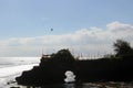 The silhouette around the iconic temple by the sea. Pura Tanah L