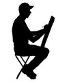 Silhouette, artist at work on a white background