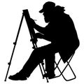 Silhouette, artist at work on a white background,