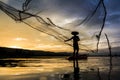 Asia fisherman in action thailand Royalty Free Stock Photo