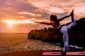 Silhouette of asian woman is practicing yoga on the asana Royalty Free Stock Photo