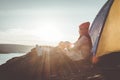 Silhouette Asian woman relaxing in nature winter season during camping Royalty Free Stock Photo