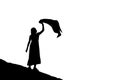 Silhouette asian woman standing waving the cloth blowing on background Royalty Free Stock Photo