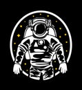 The silhouette of an astronaut in a spacesuit in outer space.