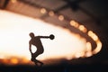 Silhouette of Athlete, Discus Soaring Track and Field Photo for Summer Games in Paris