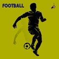 Silhouette of an athlete soccer player playing with a ball on a