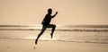 silhouette of athletic man runner running on summer beach, jogging Royalty Free Stock Photo