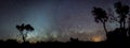 Silhouette of Australian outback panorama in front of milky way and zodiacal light Royalty Free Stock Photo