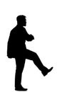 Silhouette of a Businessman Kicking