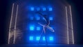 Silhouette of ballerina in form of white swan dancing ballet elements against background of smoke and spotlights with Royalty Free Stock Photo