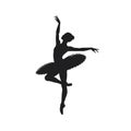 A silhouette of a ballet dancer gracefully poised on one foot captures the elegance and fluidity of movement Royalty Free Stock Photo