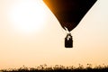 Silhouette balloon floating in the air, the sun in the evening.