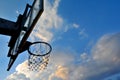 Silhouette of basketball hoop and clouds in blue sky Royalty Free Stock Photo