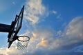 Silhouette of basketball hoop and clouds in blue sky Royalty Free Stock Photo