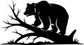 Silhouette of a bear perched on a fallen tree branch Royalty Free Stock Photo