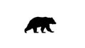 Silhouette of a bear walking depicted in solid black against a white background Royalty Free Stock Photo