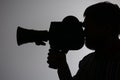 Silhouette bearded Man Movie Camera aside Royalty Free Stock Photo