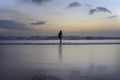 Attractive african american black woman walking on sunset beach Royalty Free Stock Photo