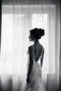 Silhouette of a beautiful bride in a traditional white wedding dress Royalty Free Stock Photo