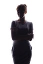 Silhouette of a beautiful girl confidently looking forward, figure of young woman on a white isolated background