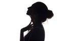 Silhouette of beautiful sensual girl, woman face profilee on white isolated background, concept of beauty and fashion