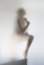 Silhouette of a beautiful woman in bathroom with shower, behind a curtain Royalty Free Stock Photo