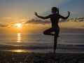 Silhouette of a beautiful Yoga woman in the morning Royalty Free Stock Photo