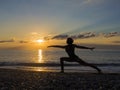 Silhouette of a beautiful Yoga woman in the morning Royalty Free Stock Photo