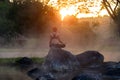 Silhouette of a beautiful Yoga woman in the morning Royalty Free Stock Photo