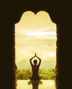 Silhouette of a beautiful Yoga woman in the morning - vintage st Royalty Free Stock Photo