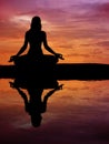 Silhouette of a beautiful Yoga woman Royalty Free Stock Photo