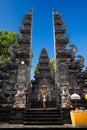 Silhouette beauty young girl, woman on the background Entrance to Balinese Hindu temple