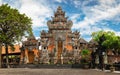 Silhouette beauty young girl, woman on the background Entrance to Balinese Hindu temple