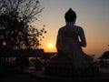 Silhouette of behind Buddha on sunset Royalty Free Stock Photo