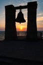 Silhouette of a bell on a background of the sea and sunset, Crimea, Chersonese Royalty Free Stock Photo